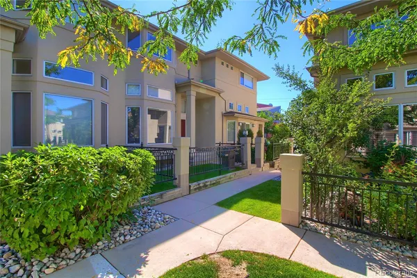 a view of a workspace with furniture