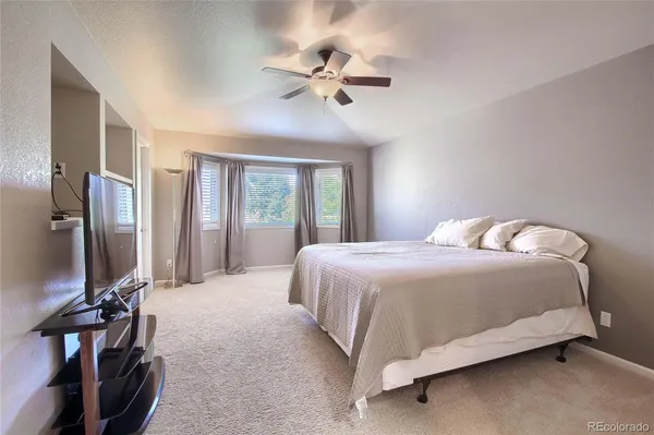 a kitchen with stainless steel appliances granite countertop a stove and a refrigerator