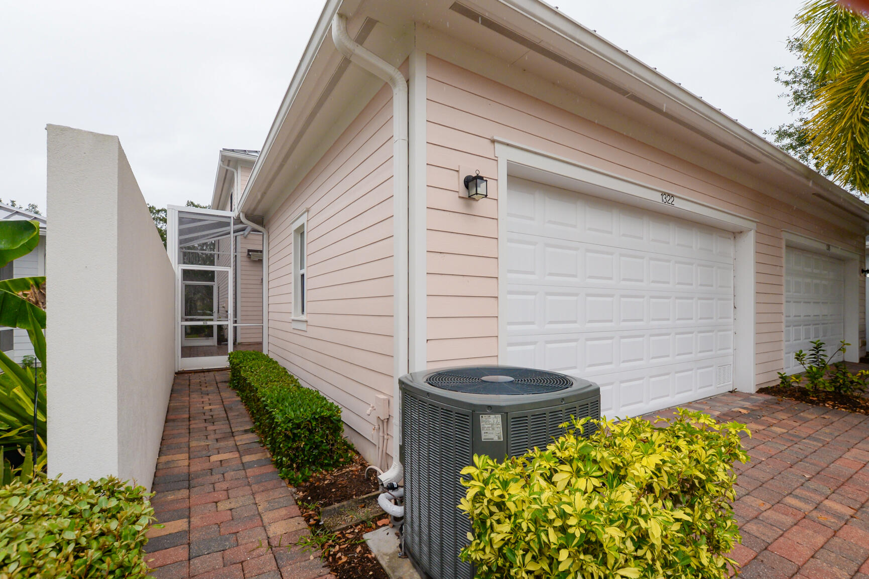 1322 Sunshine Drive Jupiter, FL 33458 - Photo 38 of 46 Side Entrance