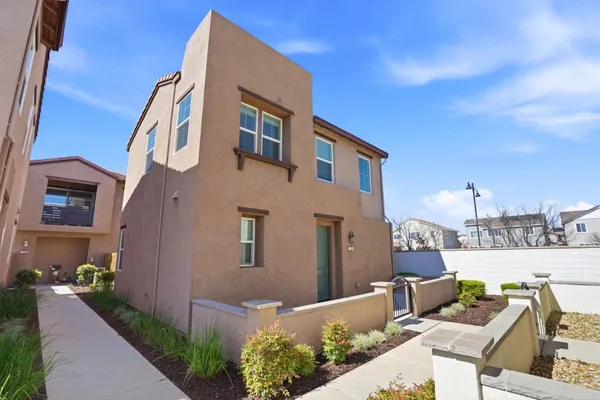 a front view of a house with patio