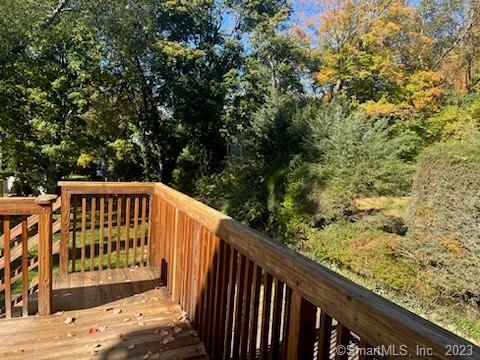 13 Hollow Tree Ridge Road Darien, CT 06820 - Photo 11 of 12 a view of street with wooden fence