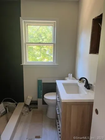 a bathroom with a sink and a toilet