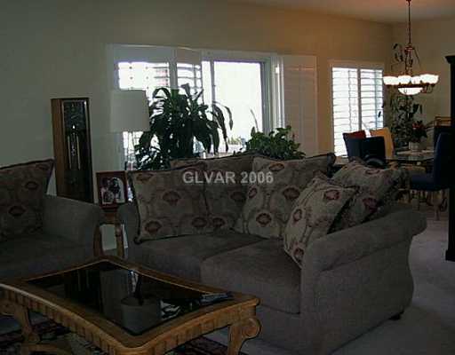 10620 Amber Ridge Drive, Unit 101 Las Vegas, NV 89144 - Photo 3 of 8 Living Room.