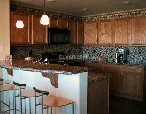 10620 Amber Ridge Drive, Unit 101 Las Vegas, NV 89144 - Photo 6 of 8 Kitchen.