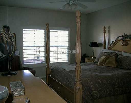 10620 Amber Ridge Drive, Unit 101 Las Vegas, NV 89144 - Photo 7 of 8 Master Bedroom.