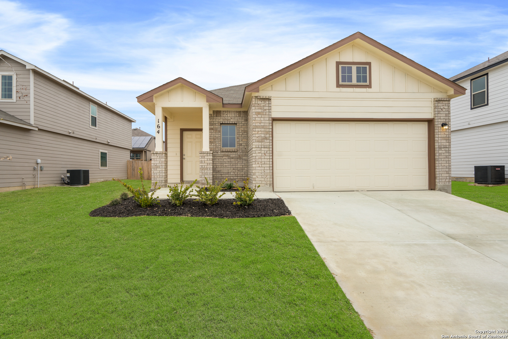 164 Foxhound Path San Antonio, TX 78253 - Photo 1 of 1 a front view of house with yard and green space