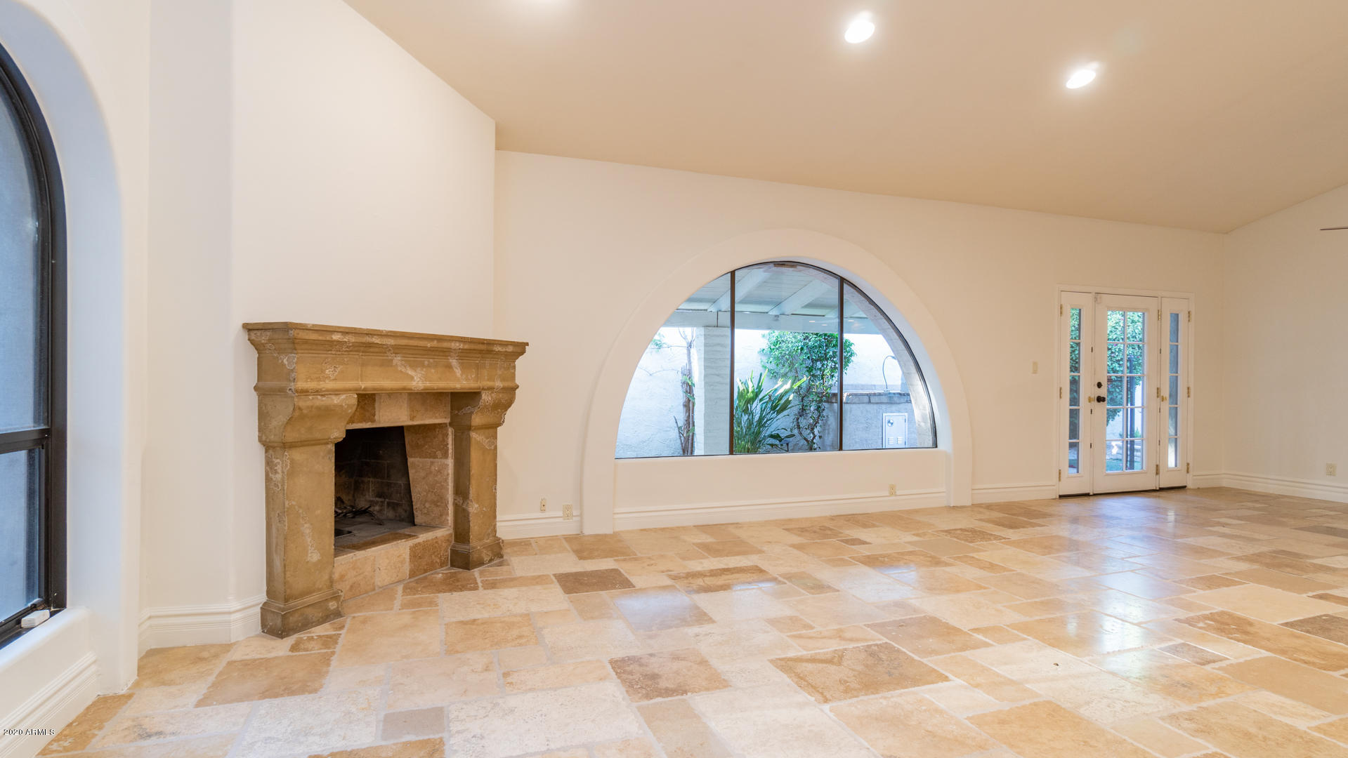 6841 North 3rd Place Phoenix, AZ 85012 - Photo 4 of 32 living room with gas fireplace