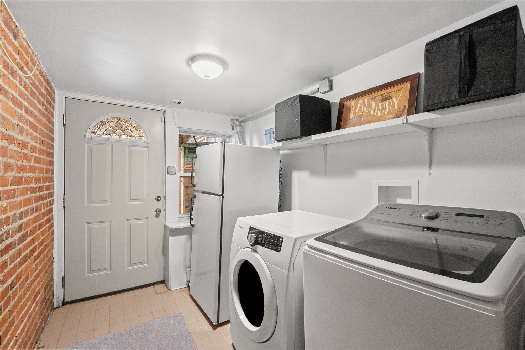 2305 38th Street Northwest Washington, DC 20007 - Photo 32 of 38 a utility room with dryer and washer