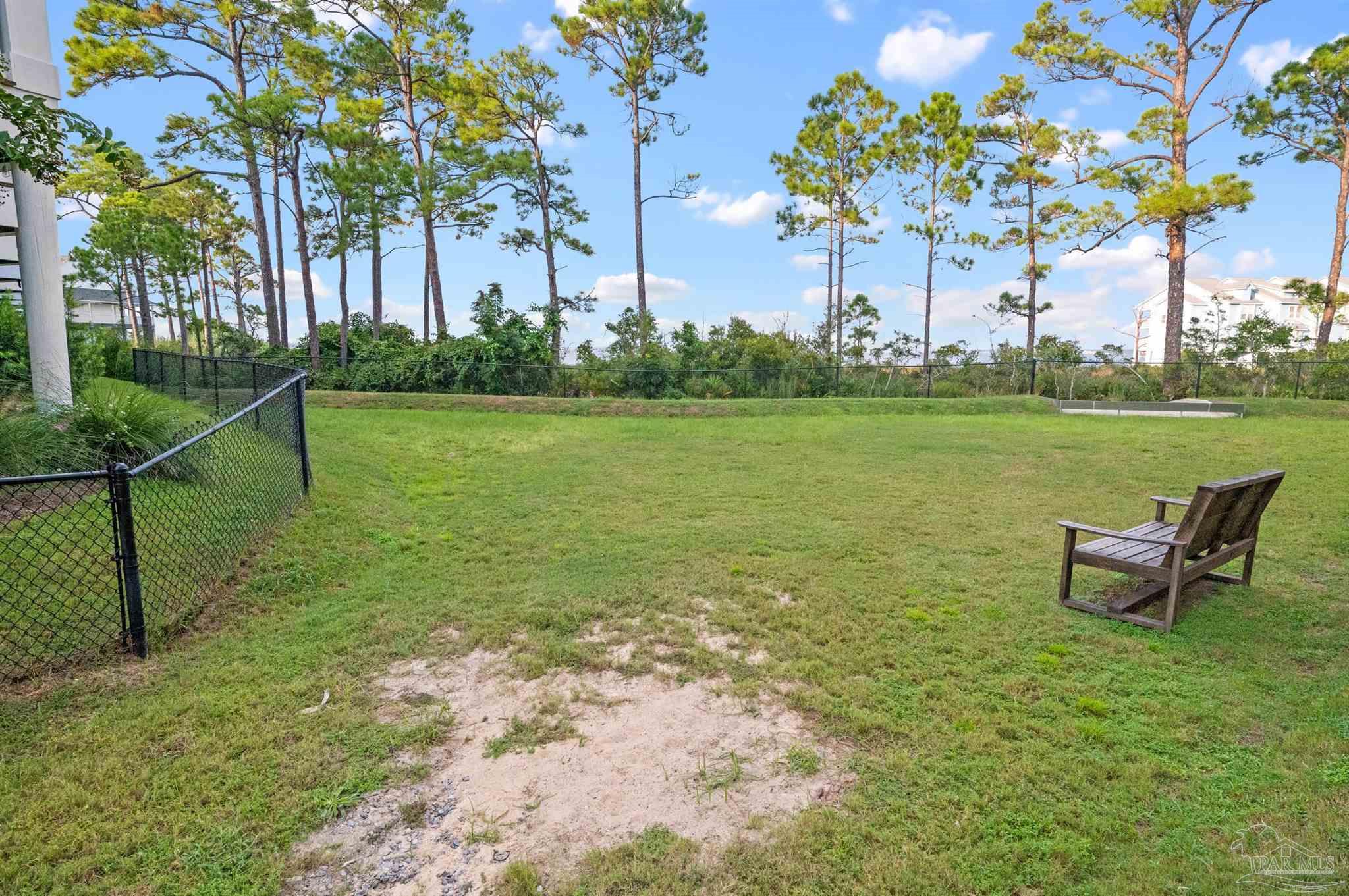 16132 Innerarity Point Road, Unit 18 Pensacola, FL 32507 - Photo 32 of 36 Fenced Dog Park Area