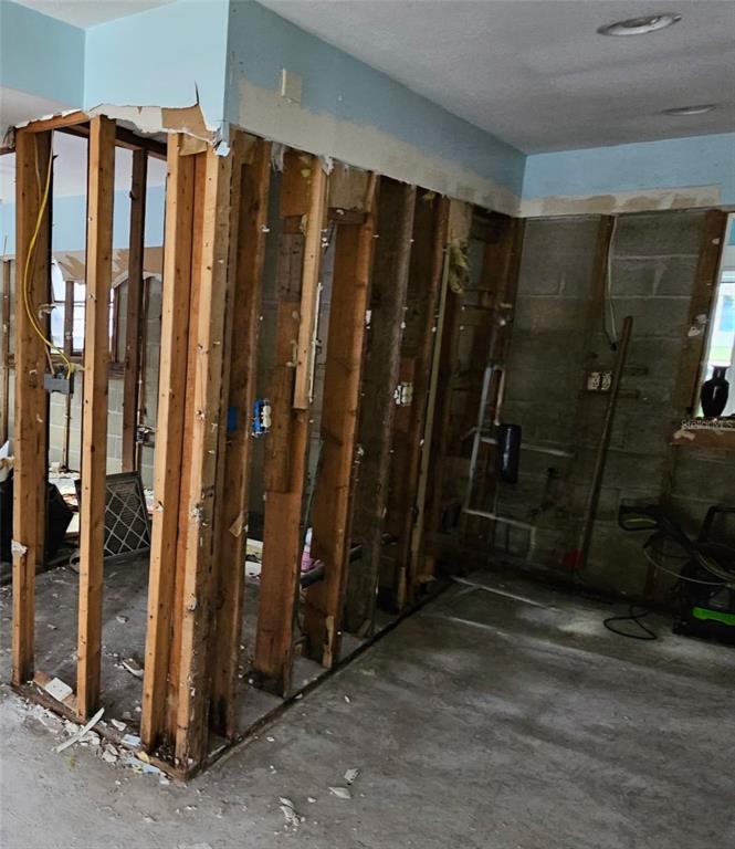 5400 Circle Drive Weeki Wachee, FL 34607 - Photo 12 of 14 a bathroom with a shower and a mirror
