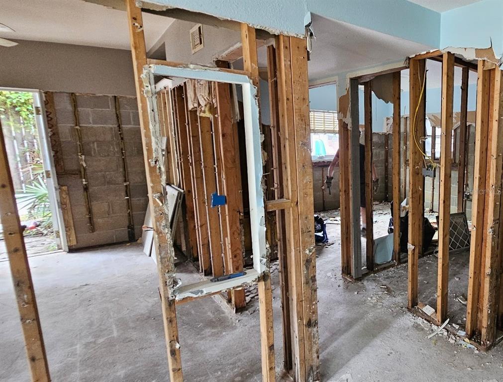5400 Circle Drive Weeki Wachee, FL 34607 - Photo 10 of 14 a view of walk in closet with clothes and shoes