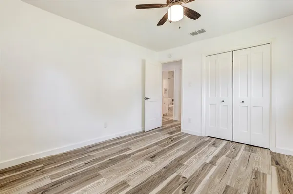 a view of a closet in a room