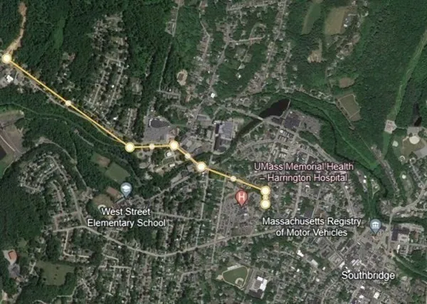 a view of a floor to ceiling window and wooden floor