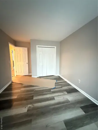 a view of room with a ceiling fan