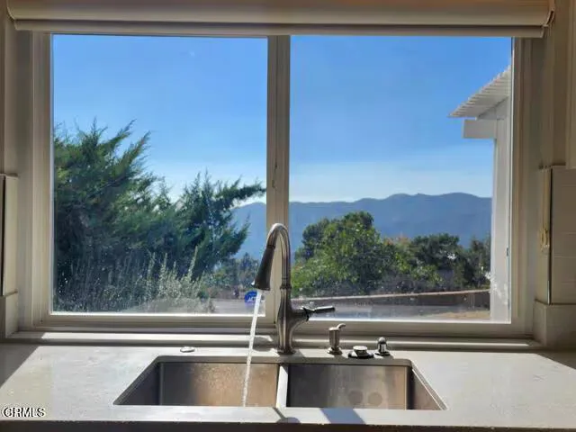 a view of a bathtub in front of a door