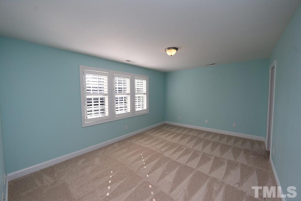 1721 Bayleaf Trail Raleigh, NC 27614 - Photo 22 of 30 a view of an empty room with a window