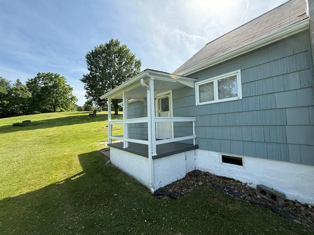 222 Bagdad Road Leechburg, PA 15656 - Photo 7 of 23 a view of a house with backyard and garden