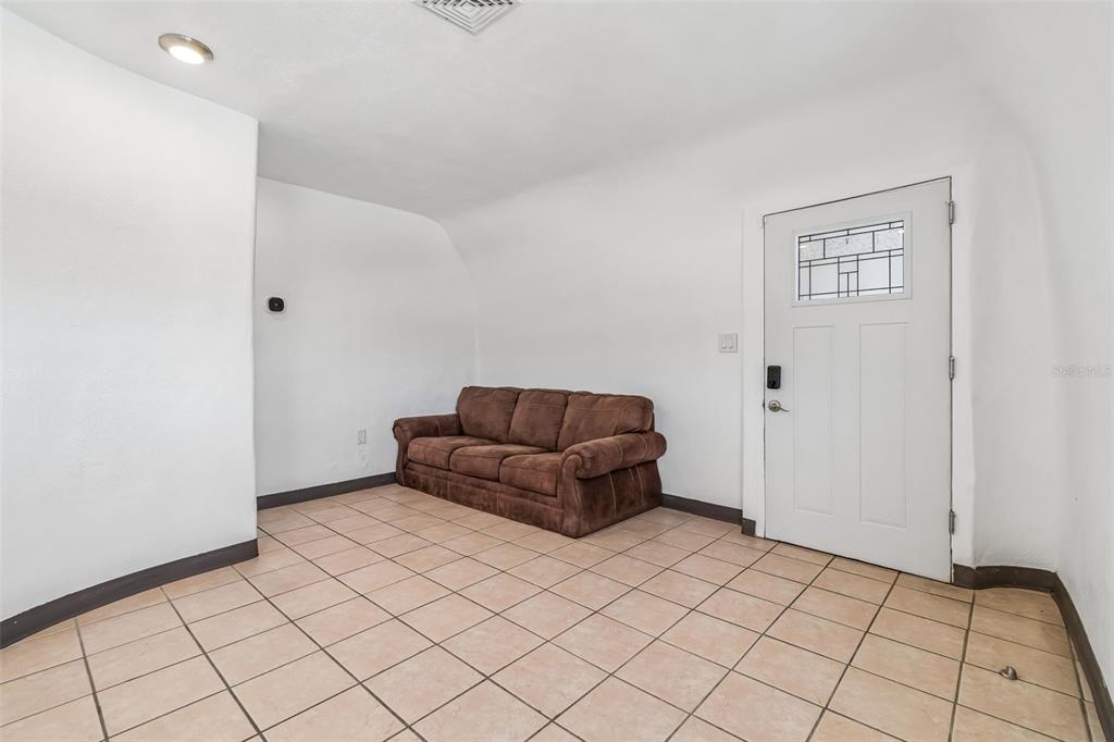 100 East Shell Point Road Ruskin, FL 33570 - Photo 17 of 41 a living room with a couch