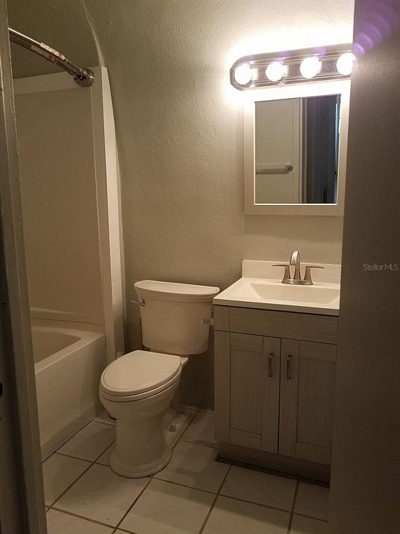 100 East Shell Point Road Ruskin, FL 33570 - Photo 32 of 41 a bathroom with a sink a toilet and shower