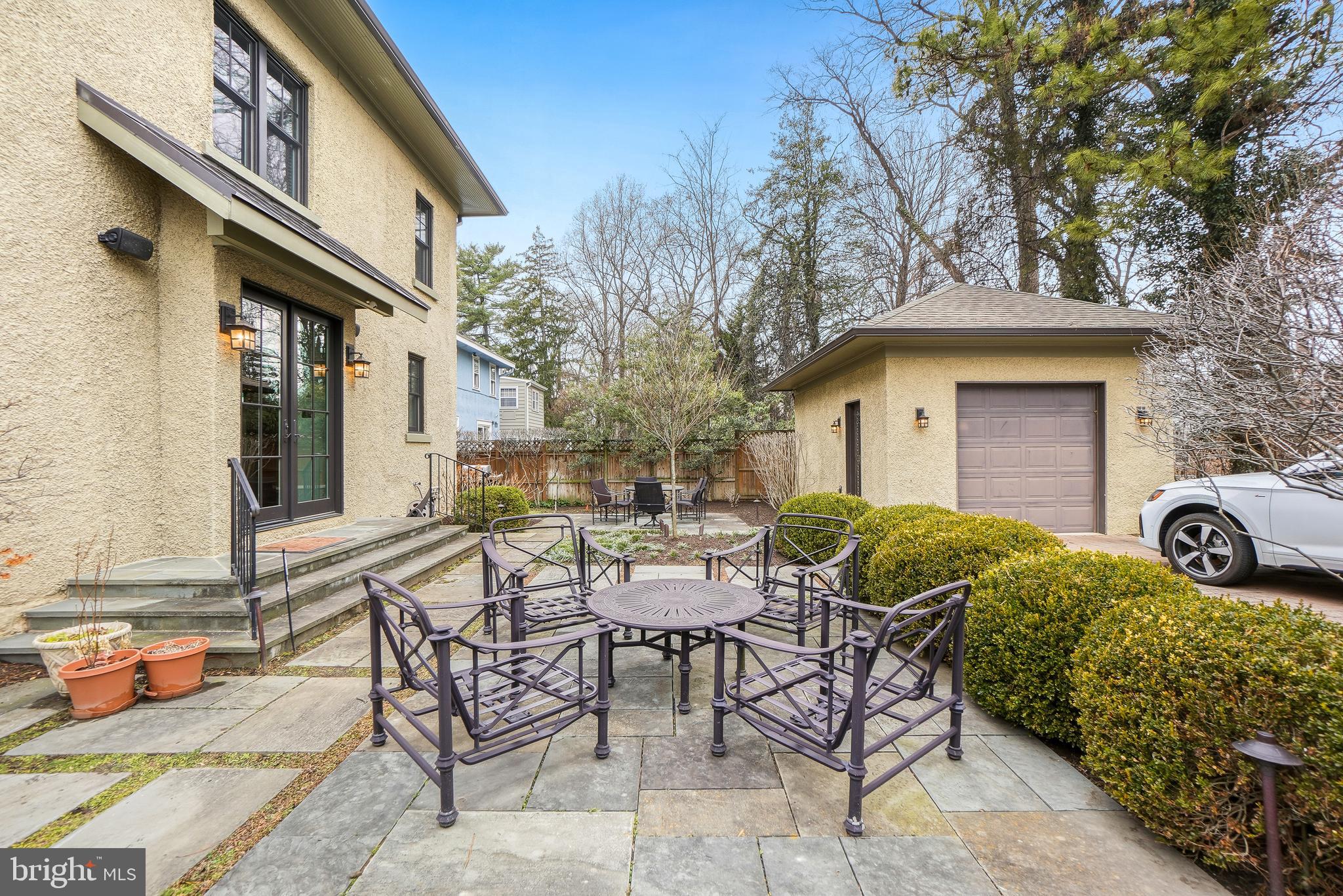 4201 Military Road Northwest Washington, DC 20015 - Photo 32 of 49 a view of a patio with table and chairs and potted plants