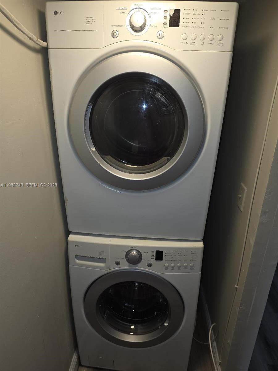 3399 Foxcroft Road, Unit 203 Miramar, FL 33025 - Photo 12 of 15 a close up view of a washer and dryer