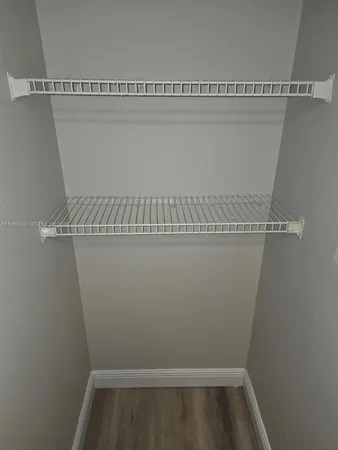 a bathroom with a toilet and a sink