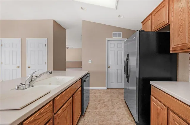 a view of a house with swimming pool and sitting area
