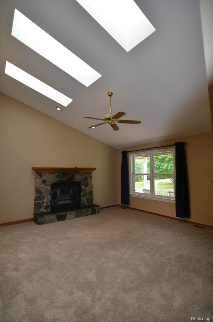 8620 Eaton Road Davisburg, MI 48350 - Photo 18 of 55 SECOND FIREPLACE WARMS THE HOME AND HEART