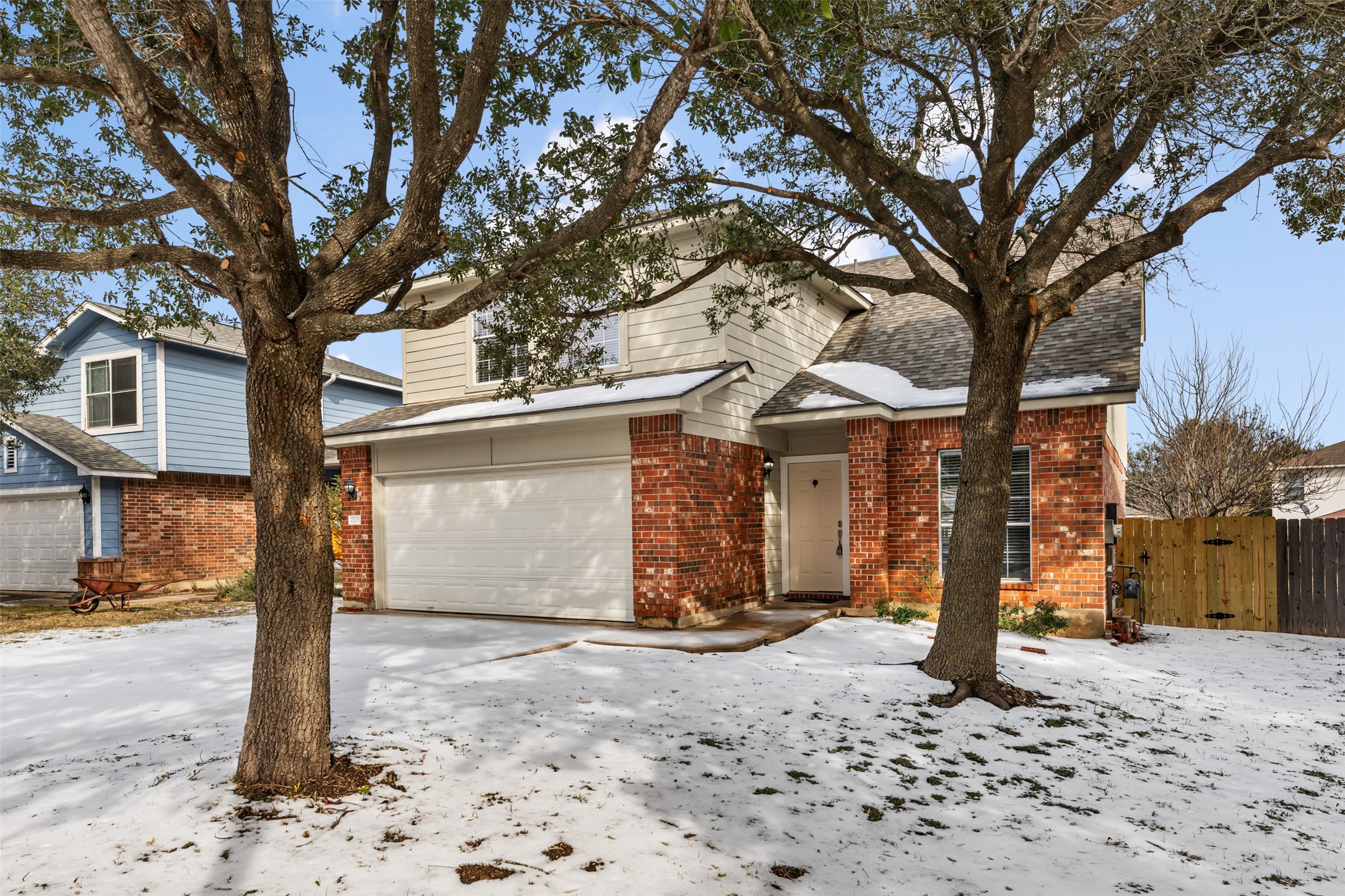 15216 Mandarin Crossing Pflugerville, TX 78660 - Photo 1 of 1 a front view of a house with a yard