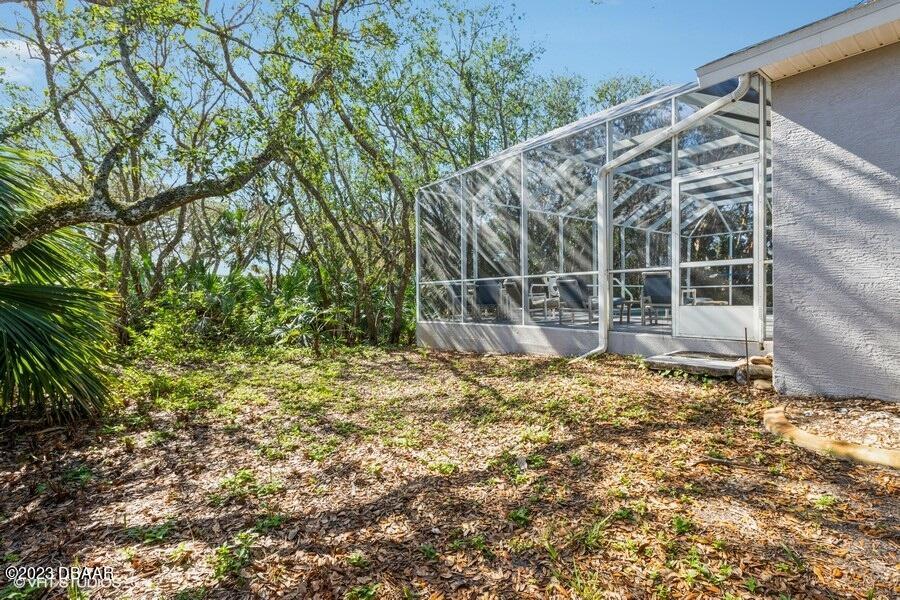 78 Jennifer Circle Ponce Inlet, FL 32127 - Photo 26 of 33 Side Yard