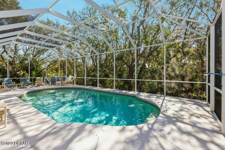 78 Jennifer Circle Ponce Inlet, FL 32127 - Photo 29 of 33 Screened Pool