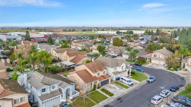 an aerial view of residential building with outdoor space