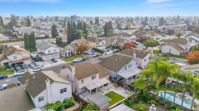 an aerial view of a city with lots of residential buildings