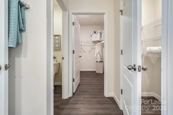 a view of a bathroom from a hallway