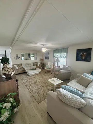 a living room with furniture and a couch