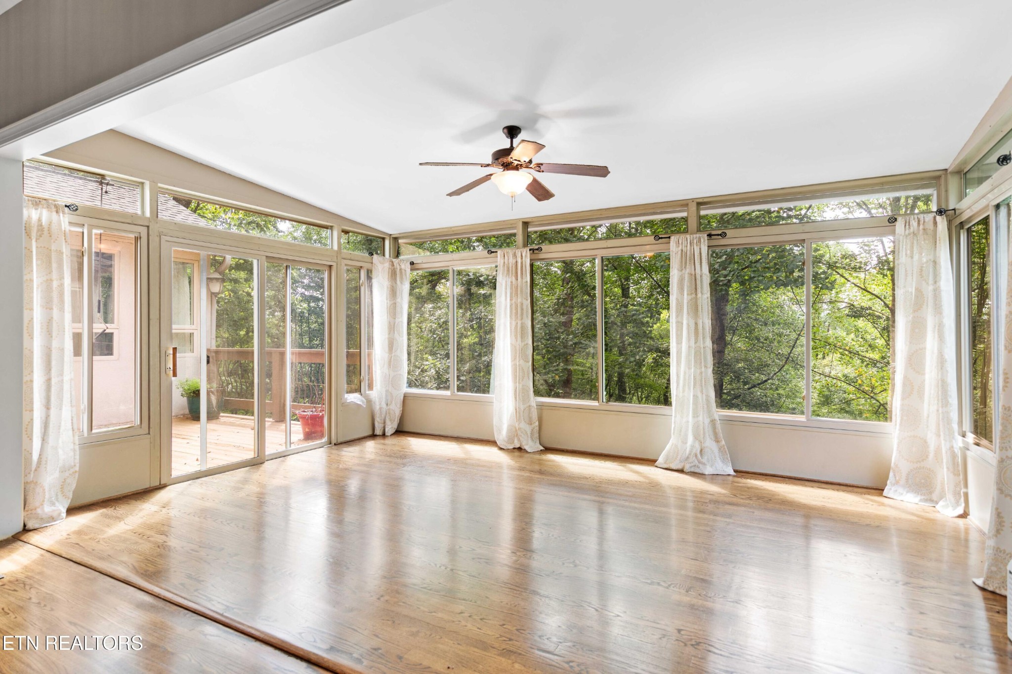 309 Bullrun Valley Drive Heiskell, TN 37754 - Photo 14 of 49 a view of an empty room with wooden floor and a window