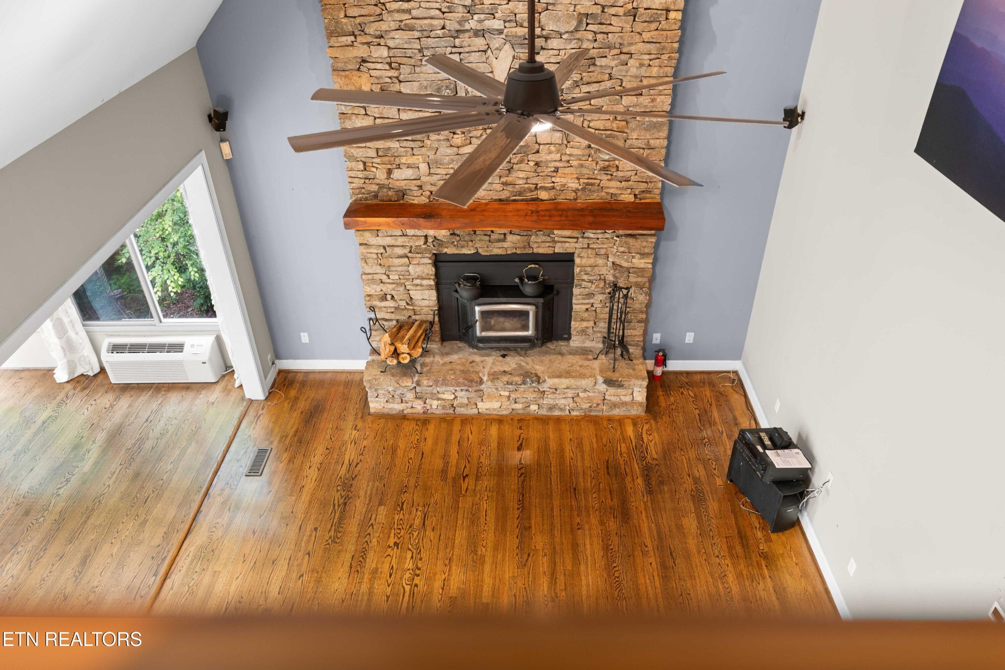 309 Bullrun Valley Drive Heiskell, TN 37754 - Photo 18 of 49 wooden floor with a fireplace in it