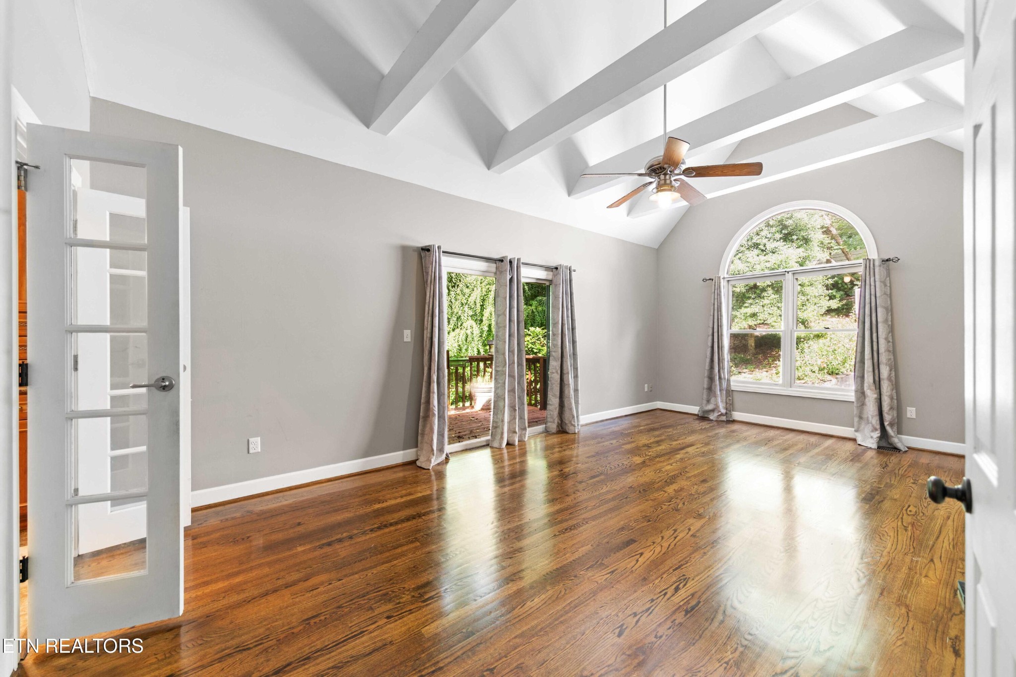 309 Bullrun Valley Drive Heiskell, TN 37754 - Photo 19 of 49 a view of an empty room with wooden floor and a window