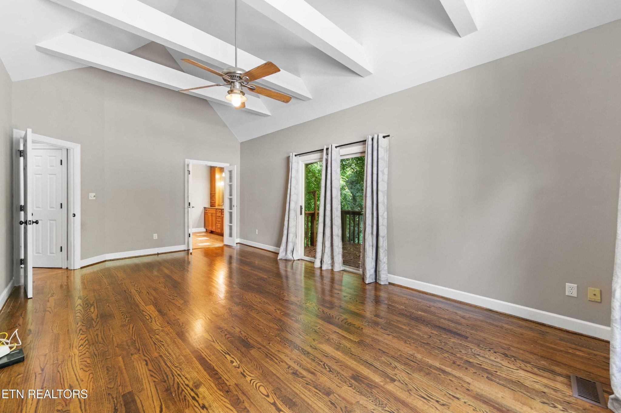 309 Bullrun Valley Drive Heiskell, TN 37754 - Photo 20 of 49 a view of an empty room with window and wooden floor