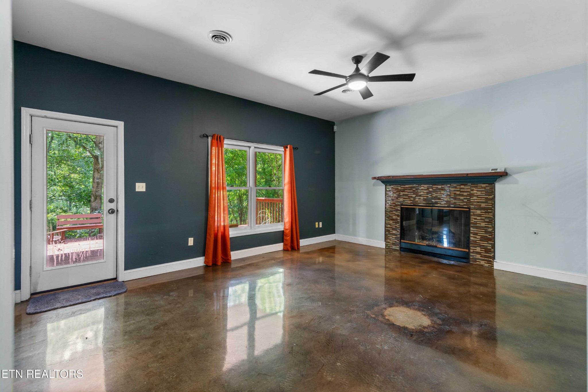 309 Bullrun Valley Drive Heiskell, TN 37754 - Photo 26 of 49 a view of an empty room with window and fire place