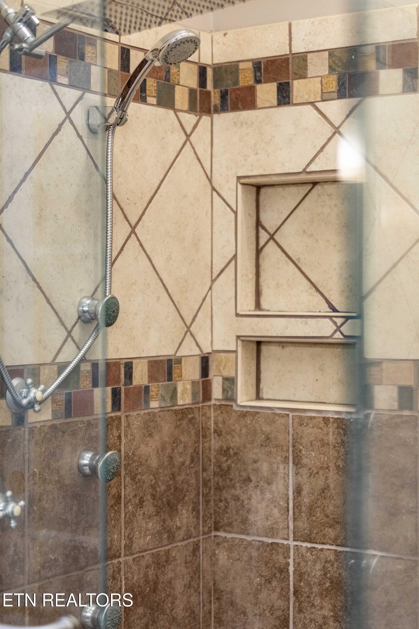 309 Bullrun Valley Drive Heiskell, TN 37754 - Photo 28 of 49 a bathroom with a shower