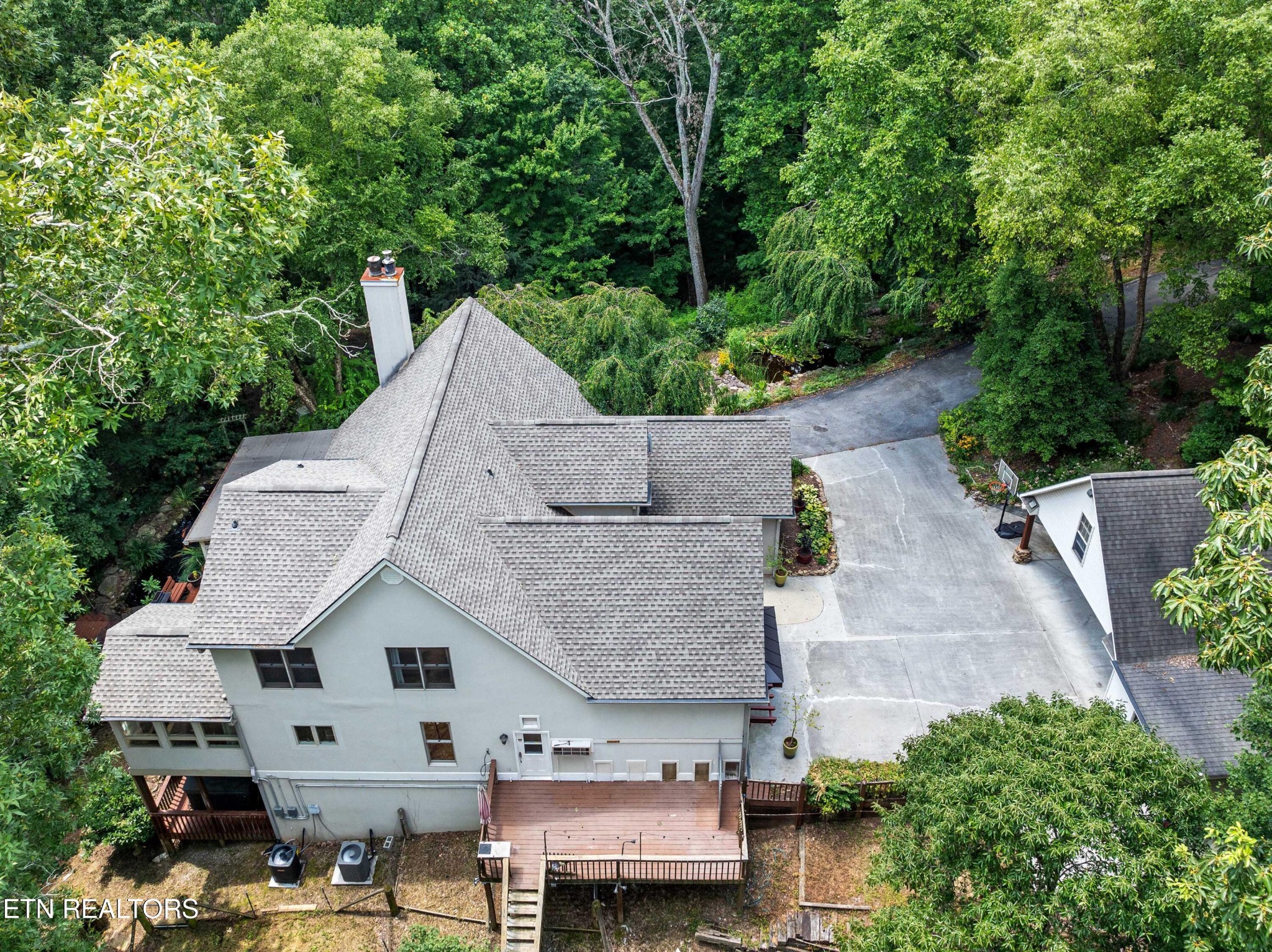 309 Bullrun Valley Drive Heiskell, TN 37754 - Photo 3 of 49 an aerial view of a house with yard and trees in the background