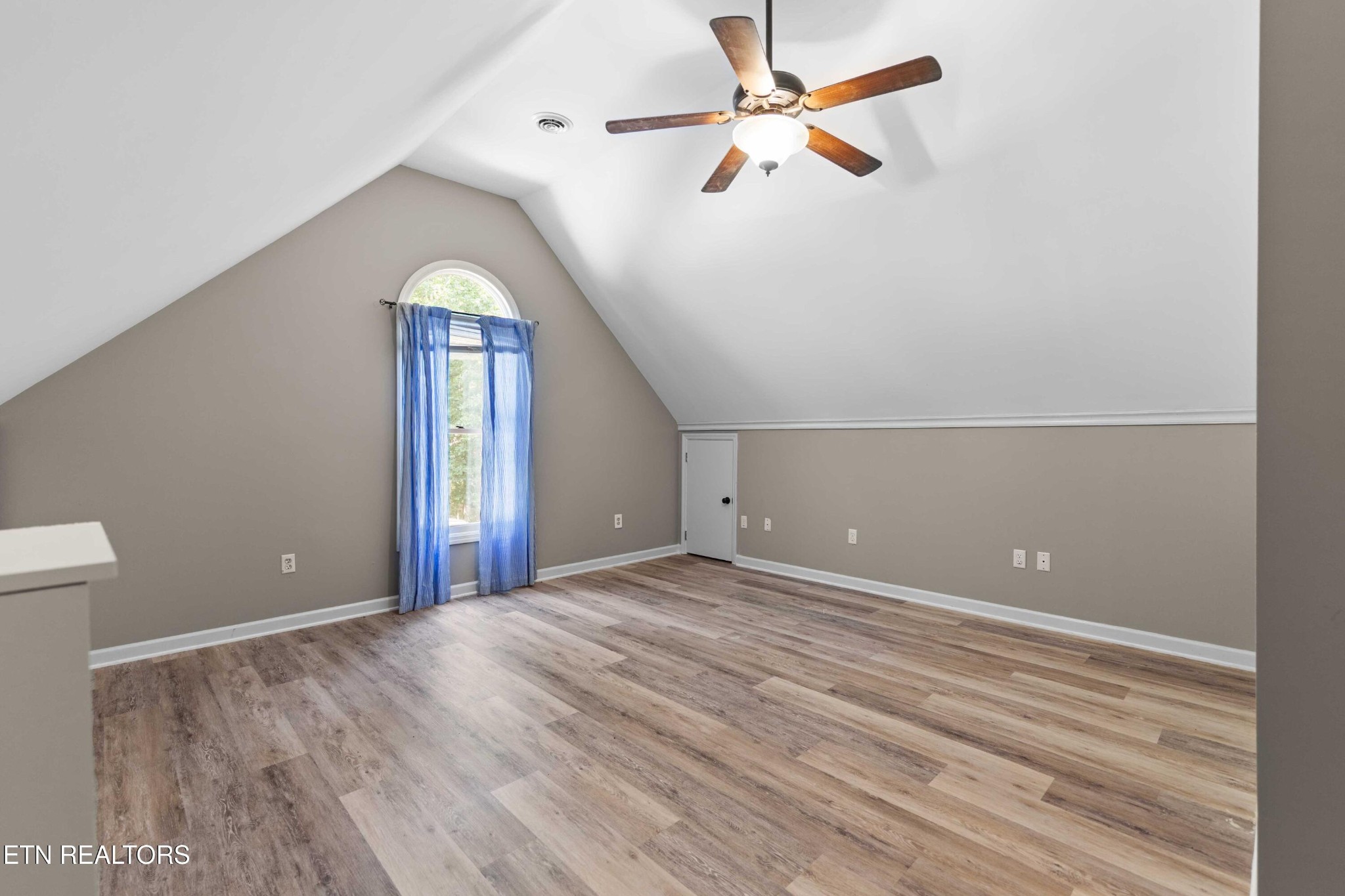 309 Bullrun Valley Drive Heiskell, TN 37754 - Photo 32 of 49 a view of a room with a dishwasher and a ceiling fan