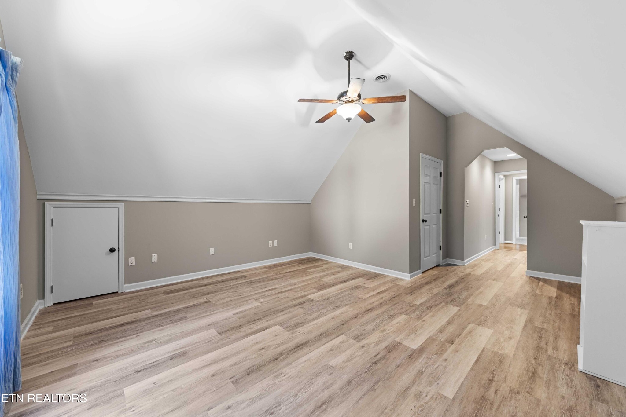 309 Bullrun Valley Drive Heiskell, TN 37754 - Photo 33 of 49 a view of a room with a ceiling fan and hardwood floor