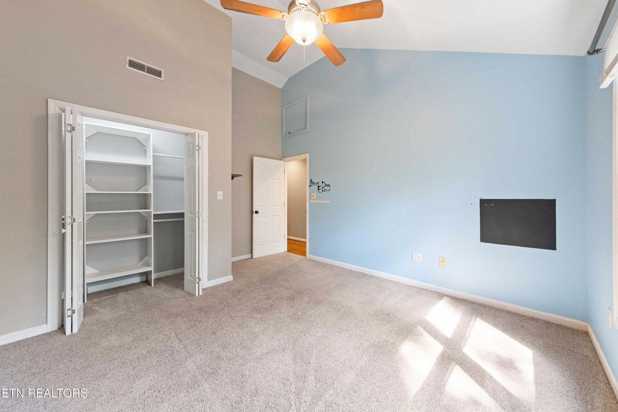 309 Bullrun Valley Drive Heiskell, TN 37754 - Photo 37 of 49 a view of a livingroom with a ceiling fan and closet