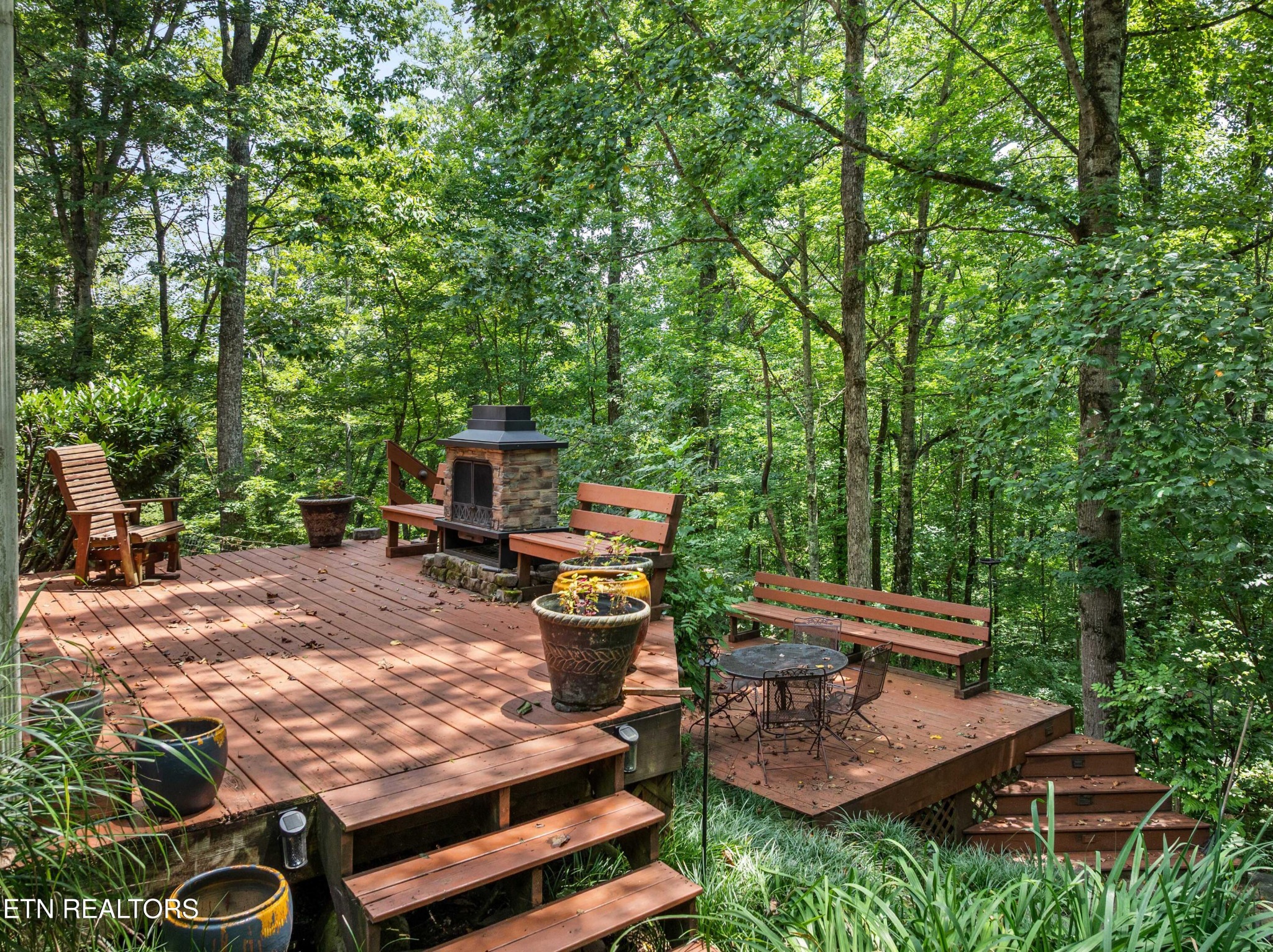 309 Bullrun Valley Drive Heiskell, TN 37754 - Photo 43 of 49 a view of a backyard with sitting area