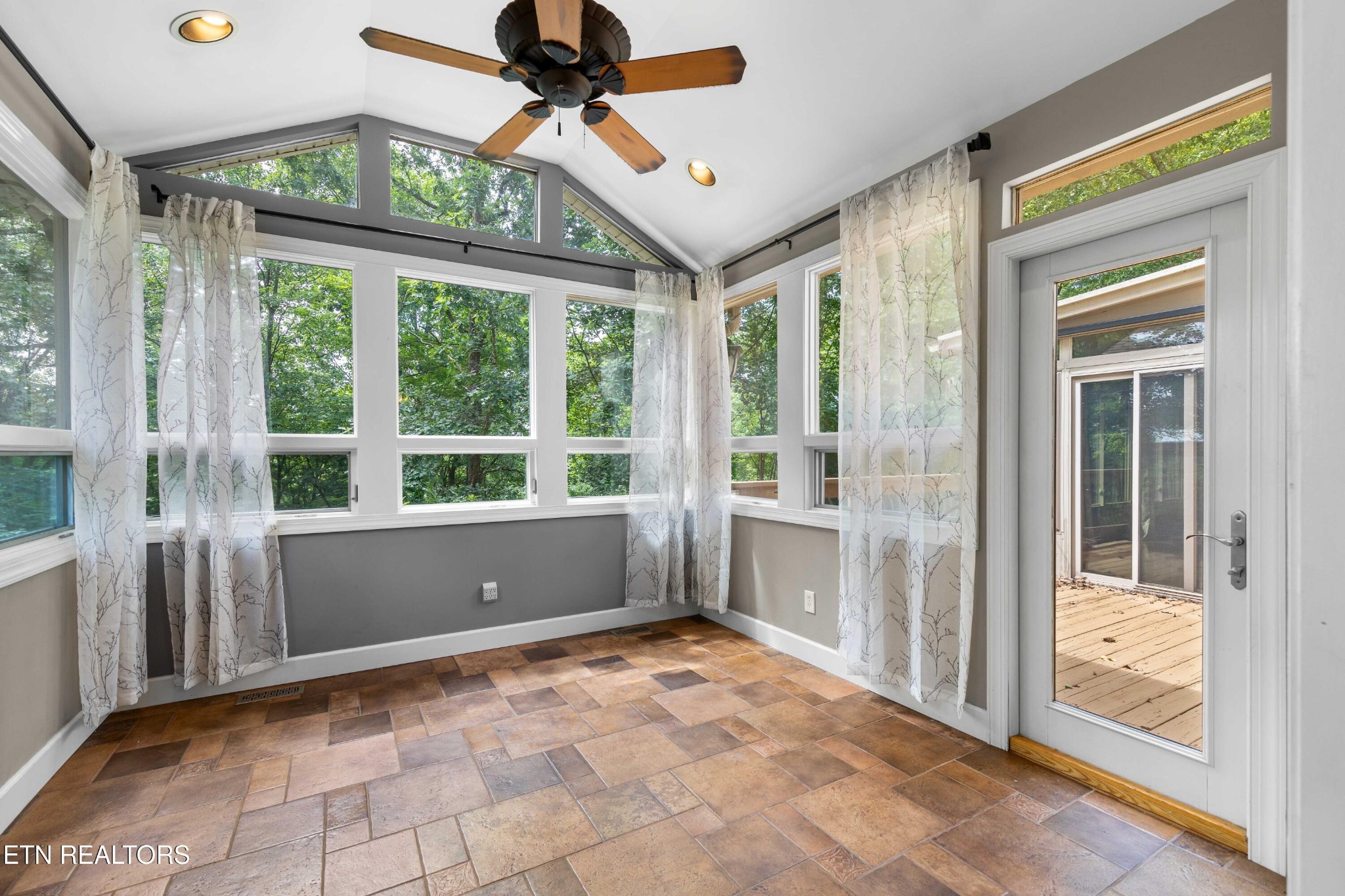 309 Bullrun Valley Drive Heiskell, TN 37754 - Photo 9 of 49 a view of an empty room with a large window with kitchen view