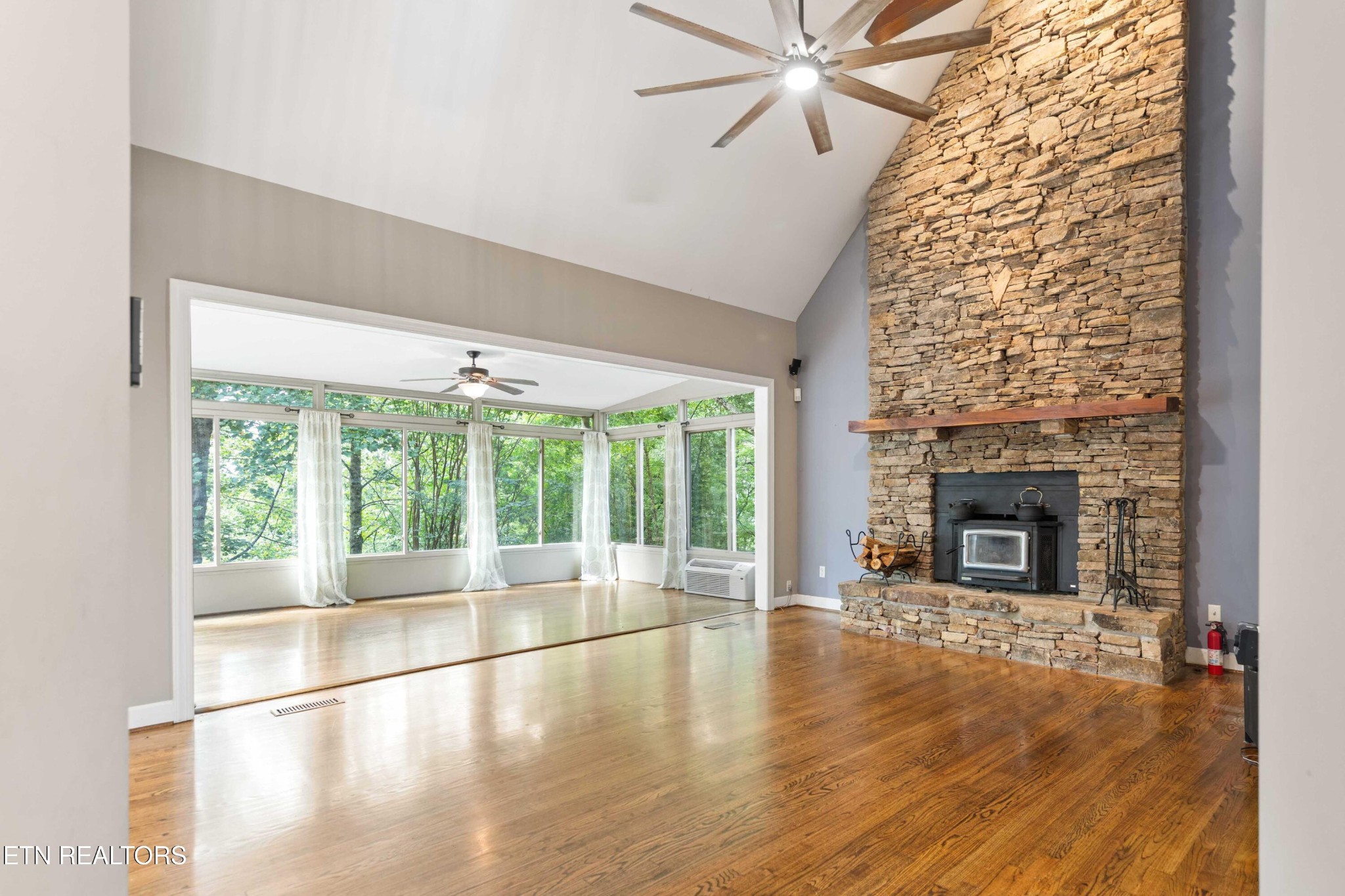 309 Bullrun Valley Drive Heiskell, TN 37754 - Photo 10 of 49 a view of an empty room with a fireplace and a window