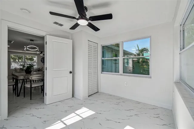 a view of livingroom with furniture and windows