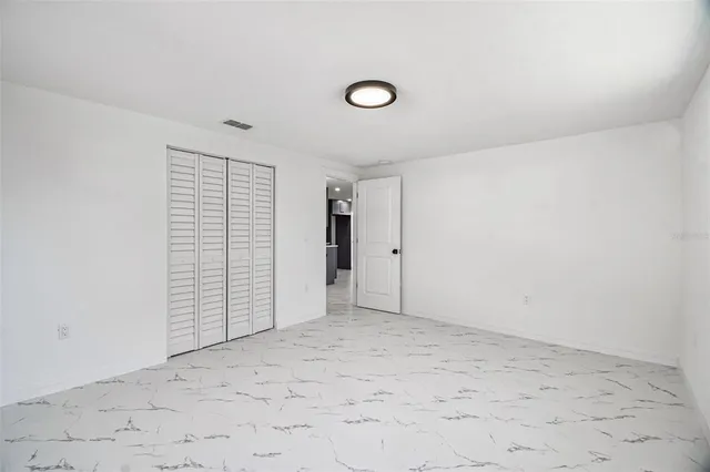 an empty room with closet